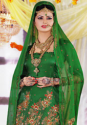 Outfit is a novel ways of getting yourself noticed. The dazzling green churidar suit have amazing embroidery patch work is done with zari, sequins and stone work. The entire ensemble makes an excellent wear. Matching churidar and dupatta is available with this suit. Slight Color variations are possible due to differing screen and photograph resolutions.