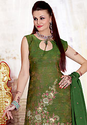 Try out this year top trend, glowing, bold and natural collection. The dazzling dark green salwar kameez have amazing embroidery patch work is done with zari, sequins, zardosi and stone work. The entire ensemble makes an excellent wear. Matching salwar and dupatta is available with this suit. Slight Color variations are possible due to differing screen and photograph resolutions.