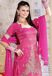 Get ready to sizzle all around you by sparkling suit. The dazzling pink salwar have amazing embroidery patch work is done with zari, sequins and stone work. The entire ensemble makes an excellent wear. Matching salwar and dupatta is available with this suit. Slight Color variations are possible due to differing screen and photograph resolutions.