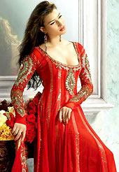 It is color this season and bright shaded suits are really something that is totally in vogue. The dazzling red net long churidar suit have amazing embroidery patch work. Heavy embroidery hand work on sleeves is done with zari, stone, diamond, golden tar and sequins work. Beautiful embroidery work on kameez is stunning. The entire ensemble makes an excellent wear. Matching churidar and dupatta is available with this suit. Asscessories shown in the image is just for photography purpose. If you need the jewellery you have to pay extra 1500/-. Slight Color variations are possible due to differing screen and photograph resolutions.