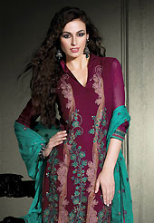 Era with extension in fashion, style, Grace and elegance have developed grand love affair with this ethnical wear. The dazzling burgundy georgette churidar suit have amazing embroidery patch work is done with resham work. Embroidery work on kameez is stunning. This is perfect party wear suit. The entire ensemble makes an excellent wear. Matching churidar and contrasting turquoise green dupatta is available with this suit. Slight Color variations are possible due to differing screen and photograph resolutions.