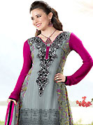 Try out this year top trend, glowing, bold and natural collection. The dazzling grey georgette churidar suit have amazing floral print and embroidery patch work is done with resham and lace work. Embroidery work on kameez is stunning. This is perfect party wear suit. The entire ensemble makes an excellent wear. Contrasting deep pink churidar and matching dupatta is available with this suit. Slight Color variations are possible due to differing screen and photograph resolutions.