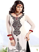 Exquisite combination of color, fabric can be seen here. The dazzling white georgette churidar suit have amazing embroidery patch work is done with resham and lace work. Embroidery work on kameez is stunning. This is perfect party wear suit. The entire ensemble makes an excellent wear. Contrasting red churidar and black dupatta is available with this suit. Slight Color variations are possible due to differing screen and photograph resolutions.