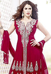 The most beautiful refinements for style and tradition. The dazzling red georgette readymade churidar suit have amazing embroidery patch work is done with stone work. The entire ensemble makes an excellent wear. Matching santoon churidar and chiffon dupatta is available with this suit. Slight Color variations are possible due to differing screen and photograph resolutions.
