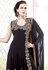 Ultimate collection of embroidered suits with fabulous style. The dazzling black georgette readymade churidar suit have amazing embroidery patch work is done with stone work. The entire ensemble makes an excellent wear. Matching santoon churidar and chiffon dupatta is available with this suit. Slight Color variations are possible due to differing screen and photograph resolutions.