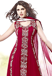 Take the fashion industry by storm in this beautiful embroidered suit. The dazzling red georgette readymade churidar suit have amazing embroidery patch work is done with stone work. The entire ensemble makes an excellent wear. Matching santoon churidar and chiffon dupatta is available with this suit. Slight Color variations are possible due to differing screen and photograph resolutions.