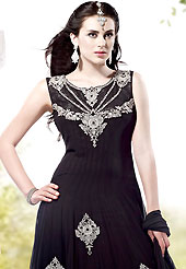 An occasion wear perfect is ready to rock you. The dazzling black georgette readymade churidar suit have amazing embroidery patch work is done with stone work. The entire ensemble makes an excellent wear. Matching santoon churidar and chiffon dupatta is available with this suit. Slight Color variations are possible due to differing screen and photograph resolutions.