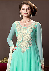 This season dazzle and shine in pure colors. The dazzling aqua georgette churidar suit have amazing embroidery patch work is done with resham and lace work. The entire ensemble makes an excellent wear. Matching churidar and contrasting cream dupatta is available with this suit. Slight Color variations are possible due to differing screen and photograph resolutions.