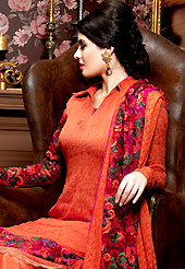 A desire that evokes a sense of belonging with a striking details. The dazzling dark orange chiffon churidar suit have amazing embroidery patch work is done with resham work. Beautiful embroidery work on kameez is stunning. The entire ensemble makes an excellent wear. Matching santoon churidar and embroidered work chiffon dupatta is available with this suit. Slight Color variations are possible due to differing screen and photograph resolutions.