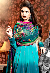 Breathtaking collection of suits with stylish embroidery work and fabulous style. The dazzling shaded teal blue and beige chiffon churidar suit have amazing embroidery patch work is done with resham and applique work. Beautiful embroidery work on kameez is stunning. The entire ensemble makes an excellent wear. Matching teal blue santoon churidar and chiffon dupatta is available with this suit. Slight Color variations are possible due to differing screen and photograph resolutions.