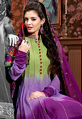 It is color this season and bright shaded suits are really something that is totally in vogue. The dazzling shaded purple and pastel green chiffon churidar suit have amazing embroidery patch work is done with resham and applique work. Beautiful embroidery work on kameez is stunning. The entire ensemble makes an excellent wear. Matching purple santoon churidar and chiffon dupatta is available with this suit. Slight Color variations are possible due to differing screen and photograph resolutions.