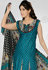 Let your personality articulate for you with this amazing embroidered suit. The dazzling turquoise blue and off white cotton readymade churidar suit have amazing floral print and embroidery patch work is done with thread and sequins work. The entire ensemble makes an excellent wear. Matching off white printed cotton churidar and printed cotton dupatta is available with this suit. Slight Color variations are possible due to differing screen and photograph resolutions.