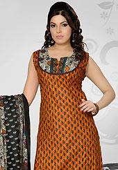 A desire that evokes a sense of belonging with a striking details. The dazzling rust cotton readymade salwar kameez have amazing floral print and embroidery patch work is done with thread and sequins work. The entire ensemble makes an excellent wear. Contrasting off white printed cotton salwar and off white and black printed cotton dupatta is available with this suit. Slight Color variations are possible due to differing screen and photograph resolutions.