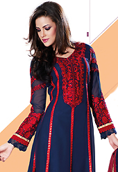 An occasion wear perfect is ready to rock you. The dazzling navy blue faux georgette churidar suit have amazing embroidery patch work is done with resham, sequins and lace work. Beautiful embroidery work on kameez is stunning. The entire ensemble makes an excellent wear. Contrasting red santoon churidar and red net dupatta is available with this suit. Slight Color variations are possible due to differing screen and photograph resolutions.