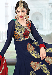 Take a look on the changing fashion of the season. The dazzling navy blue faux georgette churidar suit have amazing embroidery patch work is done with resham, zari and sequins work. Beautiful embroidery work on kameez is stunning. The entire ensemble makes an excellent wear. Matching santoon churidar and red faux chiffon dupatta is available with this suit. Slight Color variations are possible due to differing screen and photograph resolutions.