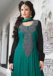 The most beautiful refinements for style and tradition. The dazzling teal green and black georgette jacquard churidar suit have amazing embroidery patch work is done with resham and lace work. Beautiful embroidery work on kameez is stunning. The entire ensemble makes an excellent wear. Matching santoon churidar and chiffon dupatta is available with this suit. Slight Color variations are possible due to differing screen and photograph resolutions.