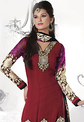 Try out this year top trend, glowing, bold and natural collection. The dazzling maroon georgette churidar suit have amazing embroidery patch work is done with resham, zari, stone, mirror and lace work. Beautiful embroidery work on kameez is stunning. The entire ensemble makes an excellent wear. Contrasting black santoon churidar and chiffon dupatta is available with this suit. Slight Color variations are possible due to differing screen and photograph resolutions.