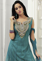 A desire that evokes a sense of belonging with a striking details. The dazzling teal green net readymade churidar suit have amazing embroidery patch work is done with stones and lace work. Beautiful embroidery work on kameez is stunning. The entire ensemble makes an excellent wear. Matching santoon churidar and net dupatta is available with this suit. Slight Color variations are possible due to differing screen and photograph resolutions.