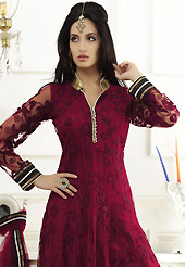 The fascinating beautiful subtly garment with lovely patterns. The dazzling maroon net readymade churidar suit have amazing embroidery patch work is done with resham and zari work. Beautiful embroidery work on kameez is stunning. The entire ensemble makes an excellent wear. Matching santoon churidar and net dupatta is available with this suit. Slight Color variations are possible due to differing screen and photograph resolutions.