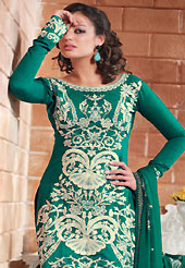 Try out this year top trend, glowing, bold and natural collection. The dazzling green crepe churidar suit have amazing geometric print and embroidery patch work is done with resham and applique work. The entire ensemble makes an excellent wear. Matching churidar and printed dupatta is available with this suit. Slight Color variations are possible due to differing screen and photograph resolutions.
