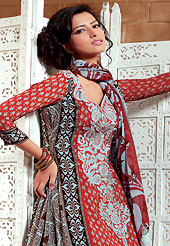 This season dazzle and shine in pure colors. The dazzling dark orange and light grey crepe churidar suit have amazing floral print and embroidery patch work is done with resham, zari and beads work. The entire ensemble makes an excellent wear. Matching light grey churidar and printed dupatta is available with this suit. Slight Color variations are possible due to differing screen and photograph resolutions.