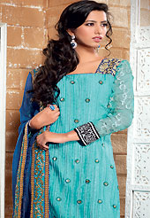 Attract all attentions with this embroidered suit. The dazzling light blue crush crepe churidar suit have amazing floral print and embroidery patch work is done with resham, zari, sequins and applique work. The entire ensemble makes an excellent wear. Contrasting dark blue churidar and dupatta is available with this suit. Slight Color variations are possible due to differing screen and photograph resolutions.