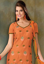 Take a look on the changing fashion of the season. This orange cotton churidar suit have amazing embroidery and patch work is done with resham work. Embroidery on kameez is highlighting the beauty of this suit. Contrasting olive green churidar and double dye chiffon dupatta come along with this suit. Slight Color variations are possible due to differing screen and photograph resolutions.