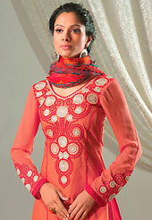 Ultimate collection of embroidered suits with fabulous style. The dazzling light rust cotton jacquard salwar kameez have amazing embroidery patch work is done with resham work. Beautiful embroidery work on kameez is stunning. Matching printed salwar and printed chiffon dupatta is available with this suit. Slight Color variations are possible due to differing screen and photograph resolutions.