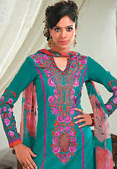 It is color this season and bright shaded suits are really something that is totally in vogue. The dazzling turquoise green cotton jacquard salwar kameez have amazing embroidery patch work is done with resham work. Beautiful embroidery work on kameez is stunning. Matching printed salwar and printed chiffon dupatta is available with this suit. Slight Color variations are possible due to differing screen and photograph resolutions.
