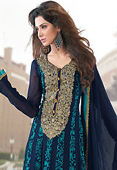 An occasion wear perfect is ready to rock you. The dazzling navy blue faux georgette churidar suit have amazing floral print and embroidery patch work is done with resham, zari and lace work. Beautiful embroidery work on kameez is stunning. The entire ensemble makes an excellent wear. Matching light blue churidar and navy blue dupatta is available with this suit. Slight Color variations are possible due to differing screen and photograph resolutions.
