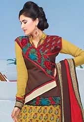 This season dazzle and shine in pure colors. The dazzling brown and yellow trouser kameez have amazing embroidery patch work is done with resham and lace work. Beautiful embroidery work on kameez is stunning. The entire ensemble makes an excellent wear. Matching brown churidar and double dye dupatta is available with this suit. Slight Color variations are possible due to differing screen and photograph resolutions.