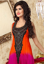 The glamorous silhouette to meet your most dire fashion needs. The dazzling dark orange and magenta net churidar suit have amazing embroidery patch bordered work is done with resham, sequins, stone and lace work. Beautiful embroidery work on kameez is stunning. The entire ensemble makes an excellent wear. Contrasting red santoon churidar and shaded net dupatta is available with this suit. Slight Color variations are possible due to differing screen and photograph resolutions.
