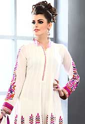 Attract all attentions with this embroidered suit. The dazzling white georgette readymade churidar suit have amazing embroidery patch work is done with resham and stone work. Beautiful embroidery work on kameez is stunning. The entire ensemble makes an excellent wear. Matching churidar and dupatta is available with this suit. Slight Color variations are possible due to differing screen and photograph resolutions.
