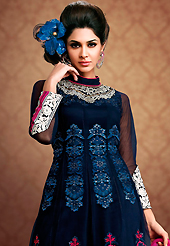 Your search for elegant look ends here with this lovely suit. The dazzling navy blue net and georgette churidar suit have amazing embroidery patch work is done with resham and stone work. Beautiful embroidery work on kameez is stunning. The entire ensemble makes an excellent wear. Matching santoon churidar and magenta georgette dupatta is available with this suit. Slight Color variations are possible due to differing screen and photograph resolutions.