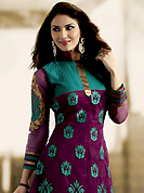 Attract all attentions with this embroidered suit. The dazzling dark purple net churidar suit have amazing embroidery patch work is done with resham and zari work. Beautiful embroidery work on kameez is stunning. The entire ensemble makes an excellent wear. Matching santoon churidar and dupatta is available with this suit. Slight Color variations are possible due to differing screen and photograph resolutions.