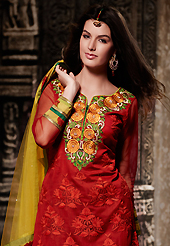 A desire that evokes a sense of belonging with a striking details. The dazzling red art silk readymade salwar kameez have amazing embroidery patch work is done with resham, sequins and lace work. The entire ensemble makes an excellent wear. Contrasting yellow salwar and yellow dupatta is available with this suit. Slight Color variations are possible due to differing screen and photograph resolutions.