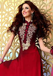 The popularity of this dress comes from the fact that it showcases the beauty modesty as well as exquisitely. The dazzling maroon and red georgette churidar suit have amazing embroidery patch work is done with resham and zari work. The entire ensemble makes an excellent wear. Matching churidar and dupatta is available with this suit. Slight Color variations are possible due to differing screen and photograph resolutions.