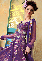 Take a look on the changing fashion of the season. The dazzling purple net churidar suit have amazing embroidery patch work is done with resham, zari, sequins, stone and lace work. The entire ensemble makes an excellent wear. Matching churidar and dupatta is available with this suit. Slight Color variations are possible due to differing screen and photograph resolutions.