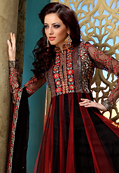 The most beautiful refinements for style and tradition. The dazzling maroon and black net churidar suit have amazing embroidery patch work is done with resham, zari and stone work. The entire ensemble makes an excellent wear. Matching churidar and dupatta is available with this suit. Slight Color variations are possible due to differing screen and photograph resolutions.