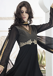 A desire that evokes a sense of belonging with a striking details. The dazzling black georgette readymade churidar suit have amazing embroidery and silk patch work is done with kasab, cutdana and lace work. Beautiful embroidery work on kameez is stunning. The entire ensemble makes an excellent wear. Matching santoon churidar and chiffon dupatta is available with this suit. Slight Color variations are possible due to differing screen and photograph resolutions.