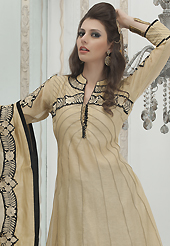 Outfit is a novel ways of getting yourself noticed. The dazzling fawn chanderi silk readymade churidar suit have amazing embroidery patch work is done with resham work. Beautiful embroidery work on kameez is stunning. The entire ensemble makes an excellent wear. Contrasting black santoon churidar and light fawn chiffon dupatta is available with this suit. Slight Color variations are possible due to differing screen and photograph resolutions.