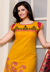 Attract all attentions with this embroidered suit. The dazzling yellow cotton jacquard churidar suit have amazing floral, abstract, block print and patch work. The entire ensemble makes an excellent wear. Contrasting red cambric cotton churidar and super net dupatta is available with this suit. Slight Color variations are possible due to differing screen and photograph resolutions.