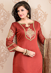 This season dazzle and shine in pure colors. The dazzling red chanderi silk churidar suit have amazing embroidery patch work is done with kasab work. The entire ensemble makes an excellent wear. Matching cotton silk churidar and fawn south silk dupatta is available with this suit. Slight Color variations are possible due to differing screen and photograph resolutions.