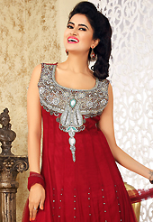 A desire that evokes a sense of belonging with a striking details. The dazzling dark red net readymade anarkali churidar suit have amazing embroidery patch work is done with silver zardosi, stone, cutdana and beads work. Beautiful embroidery work on kameez is stunning. The entire ensemble makes an excellent wear. Matching churidar and dupatta is available with this suit. Slight Color variations are possible due to differing screen and photograph resolutions.