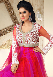 The glamorous silhouette to meet your most dire fashion needs. The dazzling magenta and red net readymade anarkali churidar suit have amazing embroidery patch work is done with resham, stone, cutdana, beads and lace work. Beautiful embroidery work on kameez is stunning. The entire ensemble makes an excellent wear. Matching churidar and dupatta is available with this suit. Slight Color variations are possible due to differing screen and photograph resolutions.