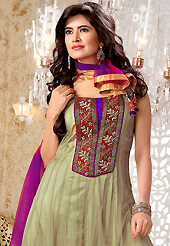 Breathtaking collection of suits with stylish embroidery work and fabulous style. The dazzling dusty beige brown net readymade anarkali churidar suit have amazing embroidery patch work is done with resham, zari, stone, cutdana and beads work. Beautiful embroidery work on kameez is stunning. The entire ensemble makes an excellent wear. Matching churidar and shaded dupatta is available with this suit. Slight Color variations are possible due to differing screen and photograph resolutions.