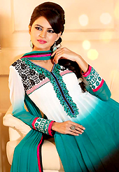 Breathtaking collection of suits with stylish embroidery work and fabulous style. The dazzling shaded white, turquoise green and black georgette churidar suit have amazing embroidery patch work is done with resham, sequins and stone work. Beautiful embroidery work on kameez is stunning. The entire ensemble makes an excellent wear. Matching santoon churidar and chiffon dupatta is available with this suit. Slight Color variations are possible due to differing screen and photograph resolutions.