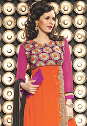 Dreamy variation on shape and forms compliment your style with tradition. The dazzling orange and pink viscose georgette churidar suit have amazing embroidery patch work is done with resham, zari, sequins, stone and lace work. Beautiful embroidery work on kameez is stunning. The entire ensemble makes an excellent wear. Contrasting black santoon churidar and black chiffon dupatta is available with this suit. Slight Color variations are possible due to differing screen and photograph resolutions.
