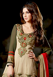 The fascinating beautiful subtly garment with lovely patterns. The dazzling fawn and dark olive green viscose georgette churidar suit have amazing embroidery patch work is done with resham and sequins work. Beautiful embroidery work on kameez is stunning. The entire ensemble makes an excellent wear. Contrasting red churidar and double dye dupatta is available with this suit. Slight Color variations are possible due to differing screen and photograph resolutions.