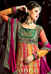 Outfit is a novel ways of getting yourself noticed. The dazzling orange georgette churidar suit have amazing embroidery patch work is done with resham, zari and stone work. Beautiful embroidery work on kameez is stunning. The entire ensemble makes an excellent wear. Contrasting dark magenta santoon churidar and dark magenta chiffon dupatta is available with this suit. Slight Color variations are possible due to differing screen and photograph resolutions.